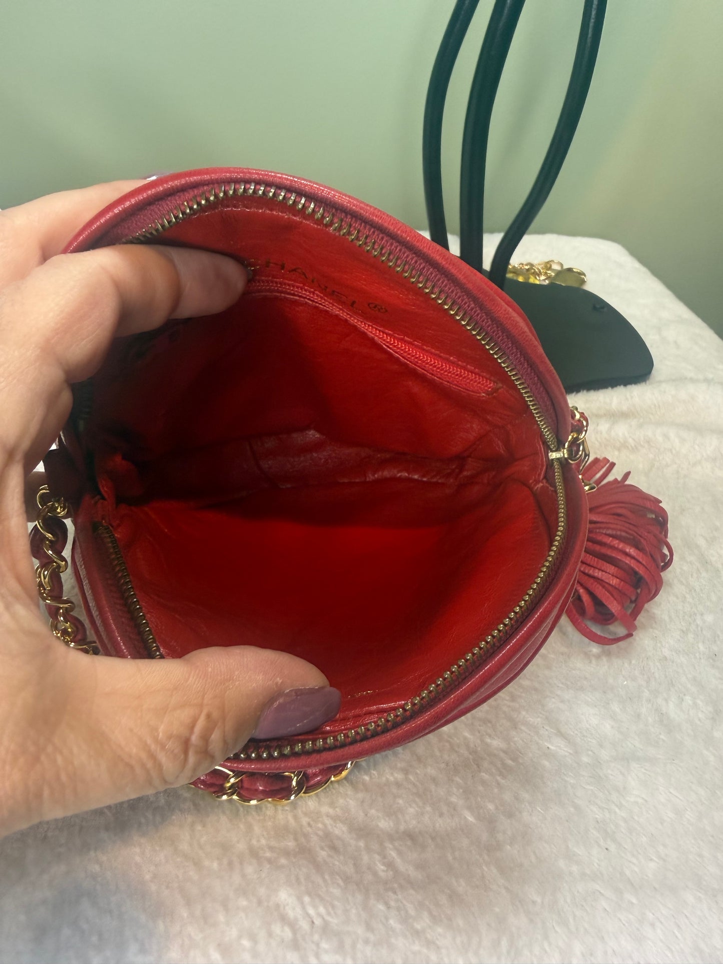 1051. Chanel Red Quilted Round Crossbody with Gold