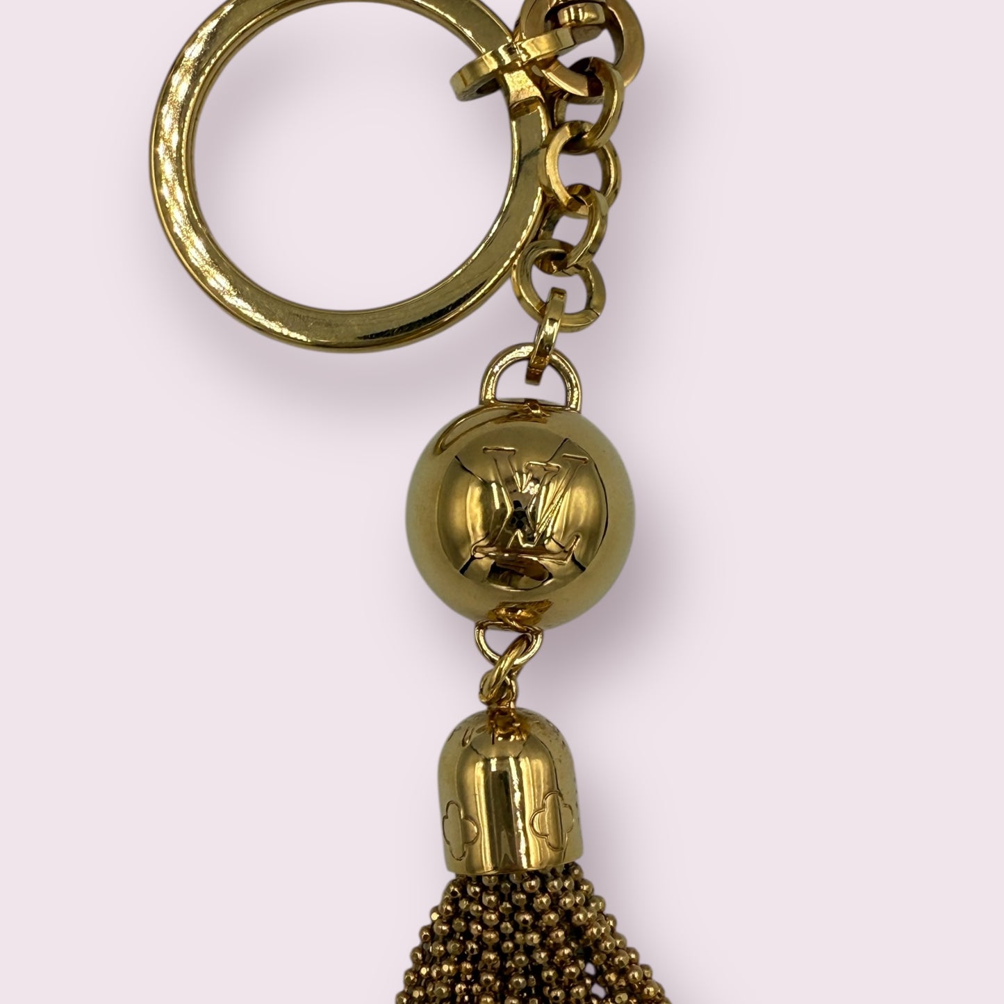309. Louis Vuitton Gold Tassel Bag Charm