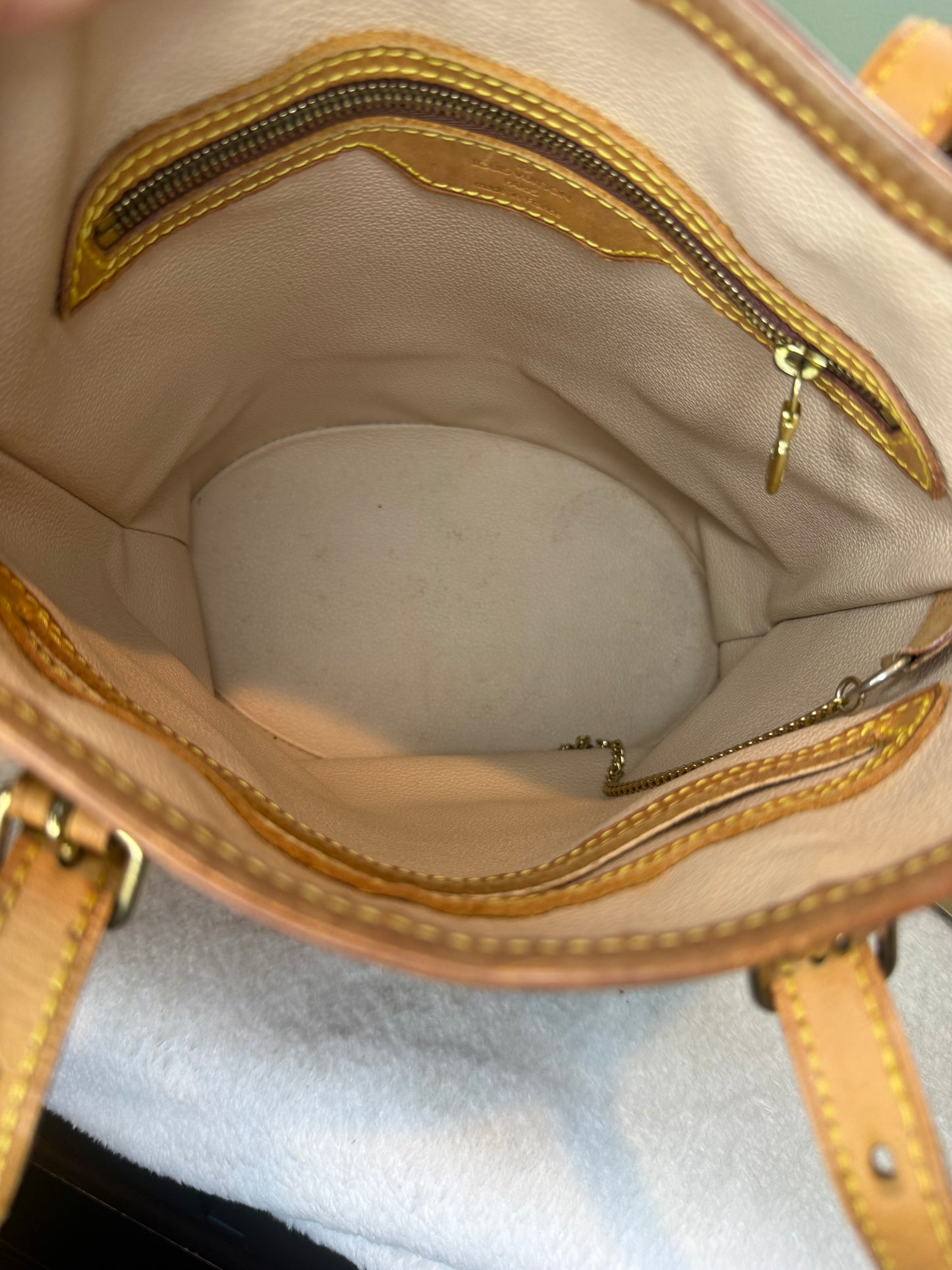 1469. Louis Vuitton Monogram Petit Bucket Bag