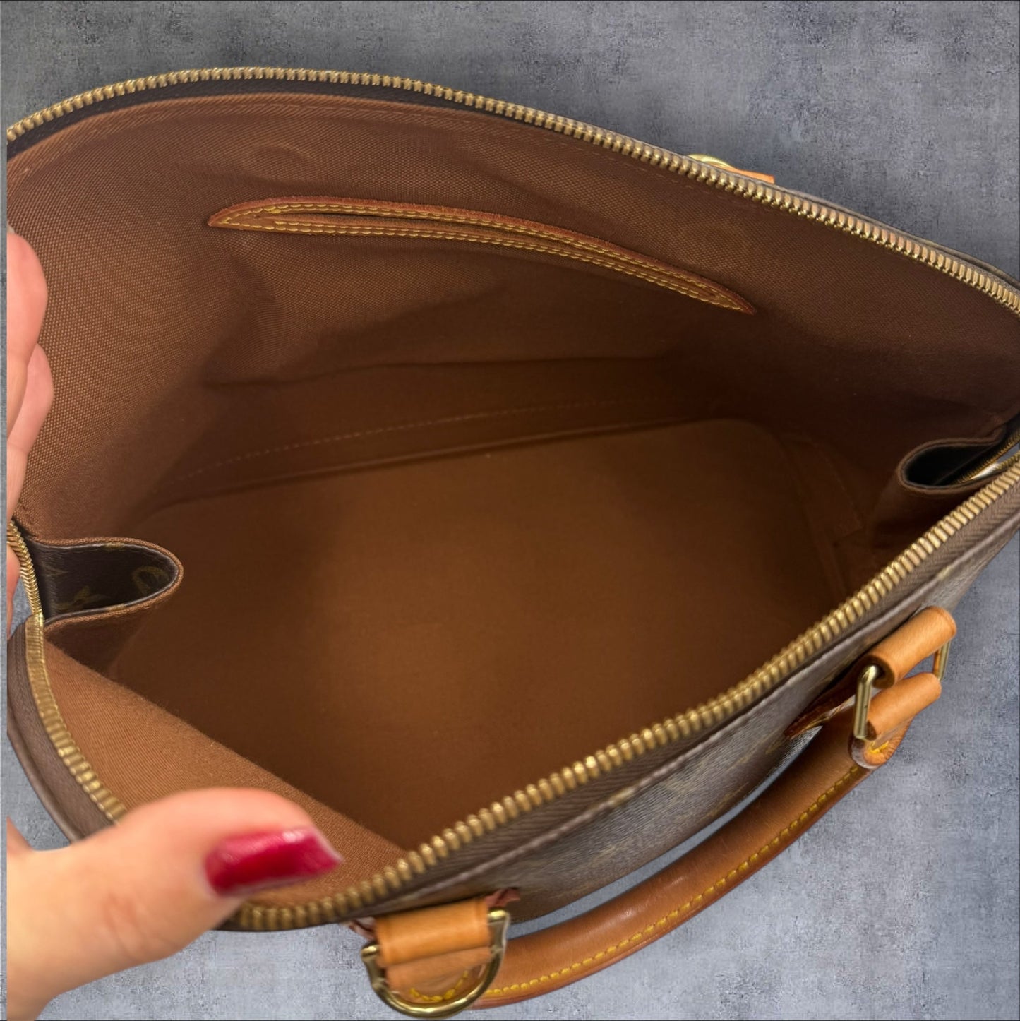 314. Louis Vuitton Monogram Alma PM