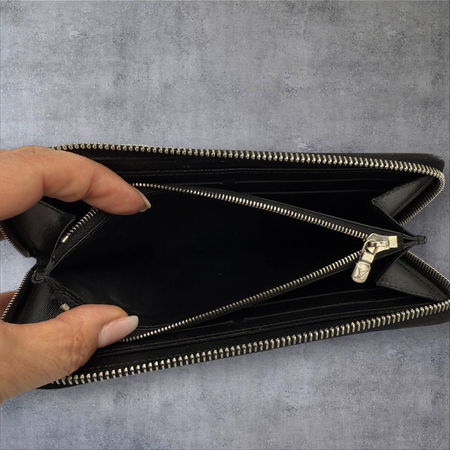 312. Louis Vuitton Black Epi Long Zippy Wallet