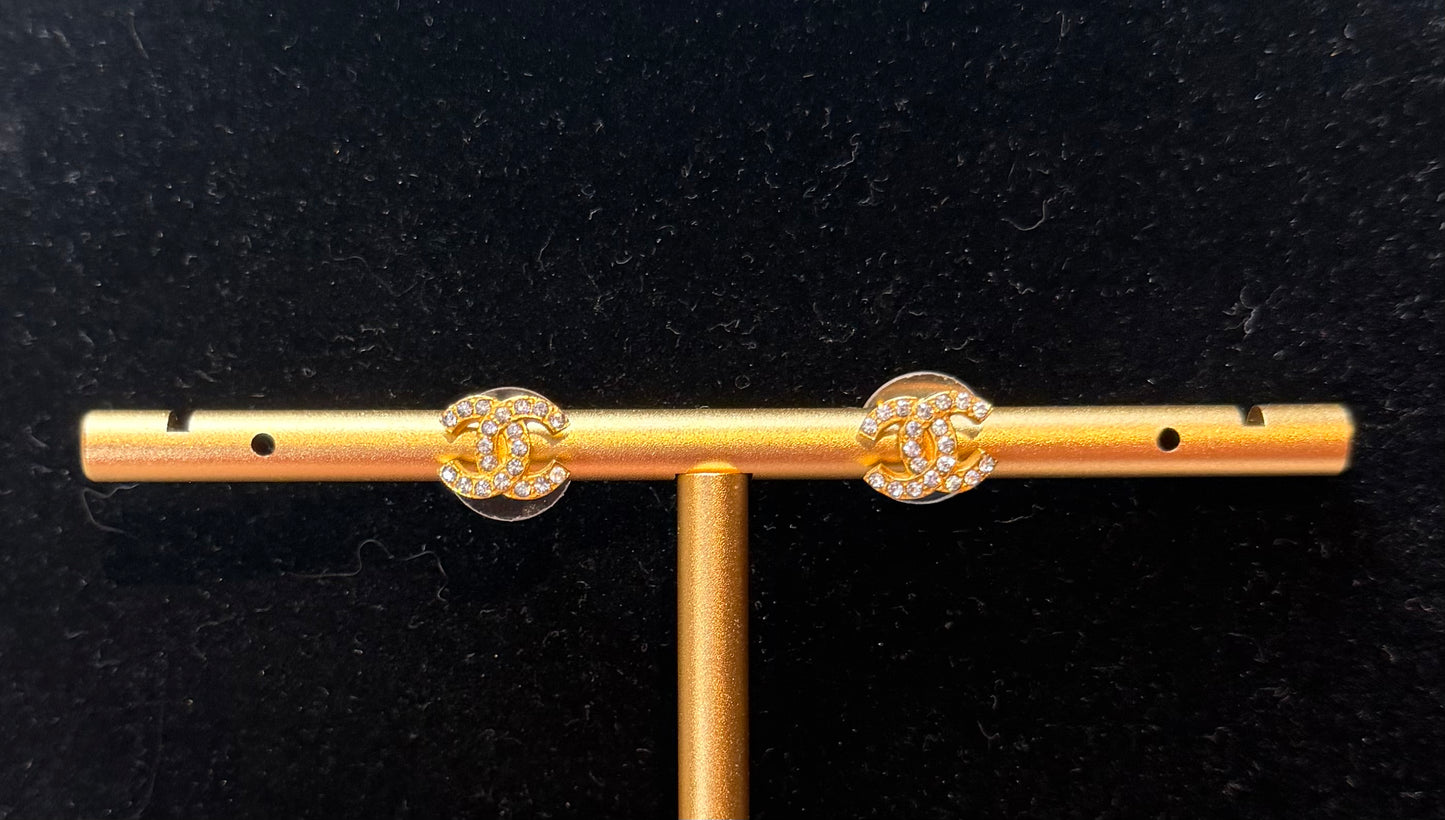 1565. Chanel Gold Toned CC Logo Rhinestone Earrings