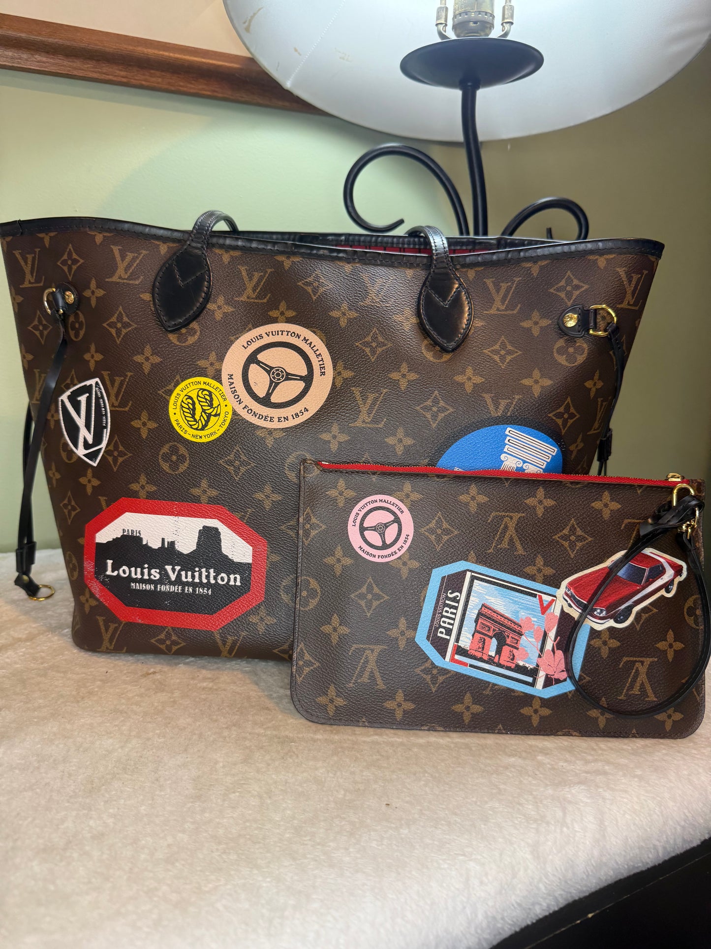 1292. Louis Vuitton Monogram World Tour Neverfull MM with Pouch