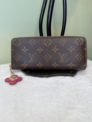 1759. Louis Vuitton Monogram Clemence Wallet with Fuchsia and Flower zipper pull