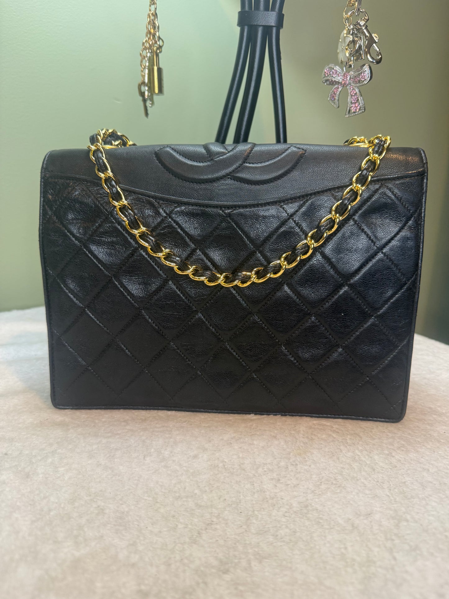 817. Chanel Quilted Lambskin Leather Flap Crossbody Series 1