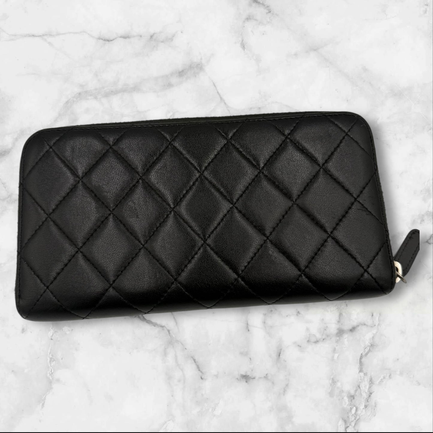 Chanel Black Classic Lambskin Zippy wallet with Silver Hardware