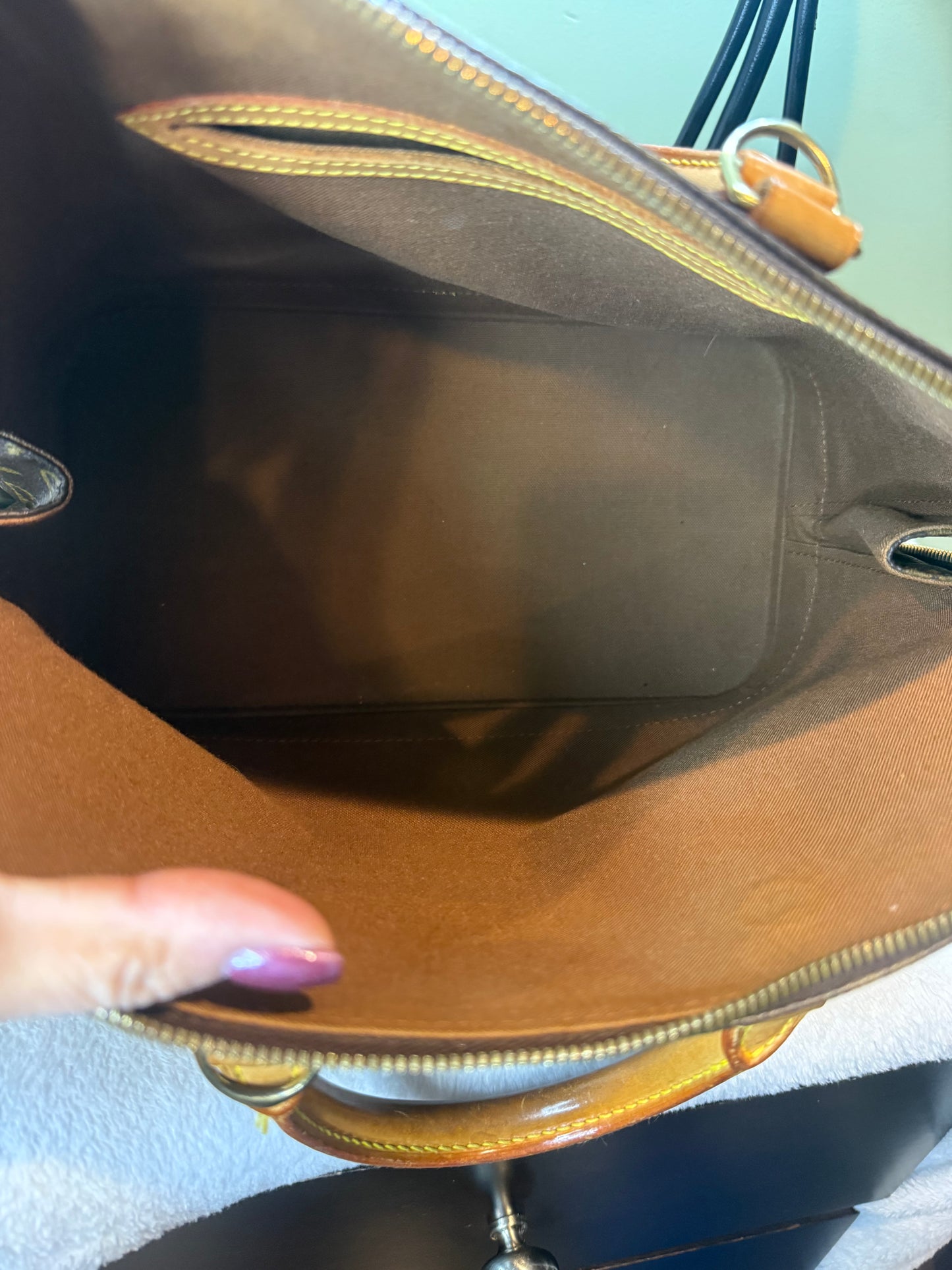 1294. Louis Vuitton Monogram Alma PM
