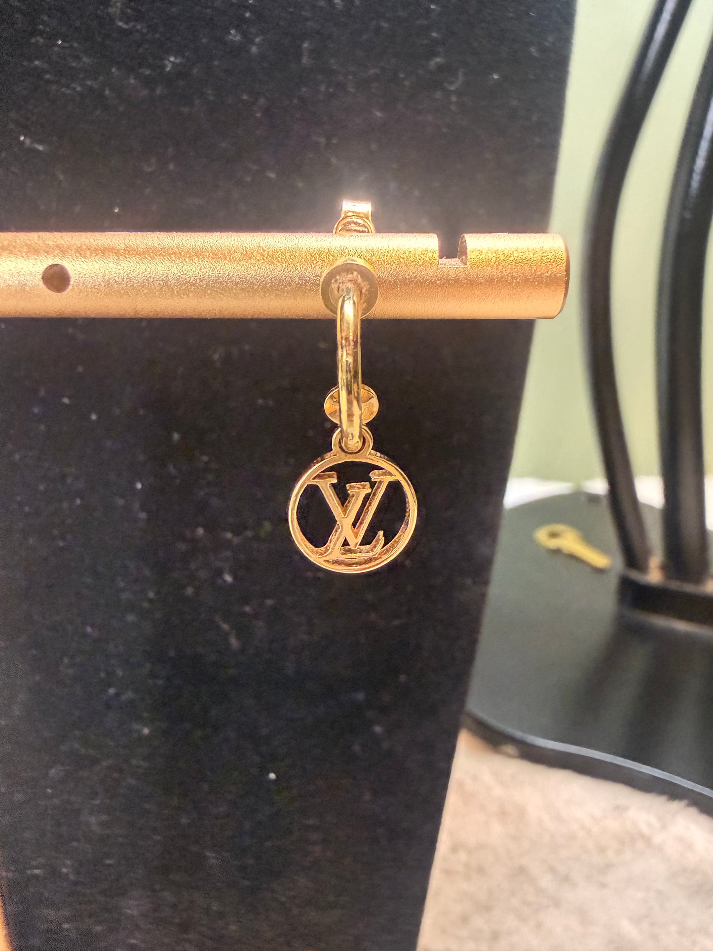 1305. Louis Vuitton Blooming Earrings with Asymmetrical dangling charms