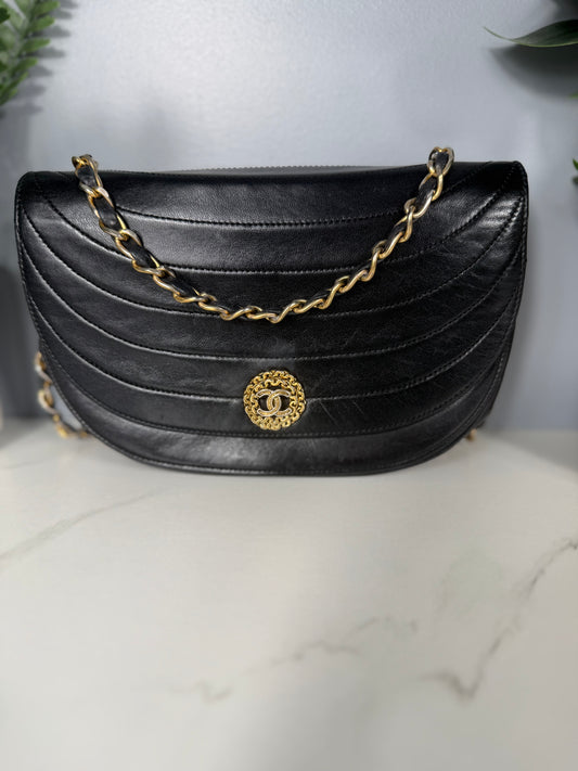 2230. Chanel Black Lambskin half moon Flap Bag