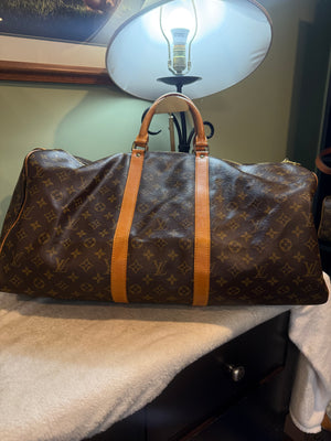 1557. Louis Vuitton Monogram Keepall 55