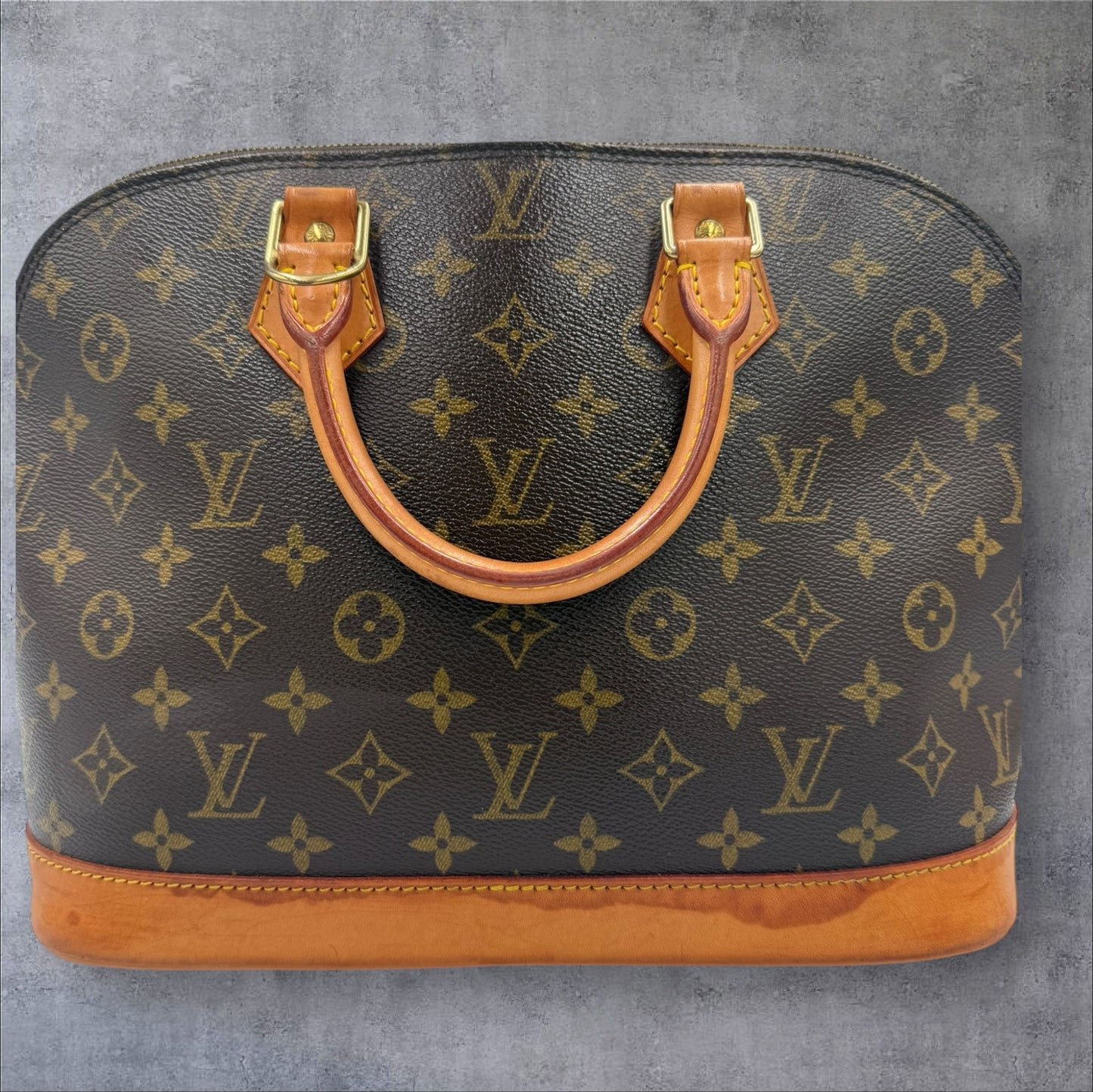 314. Louis Vuitton Monogram Alma PM