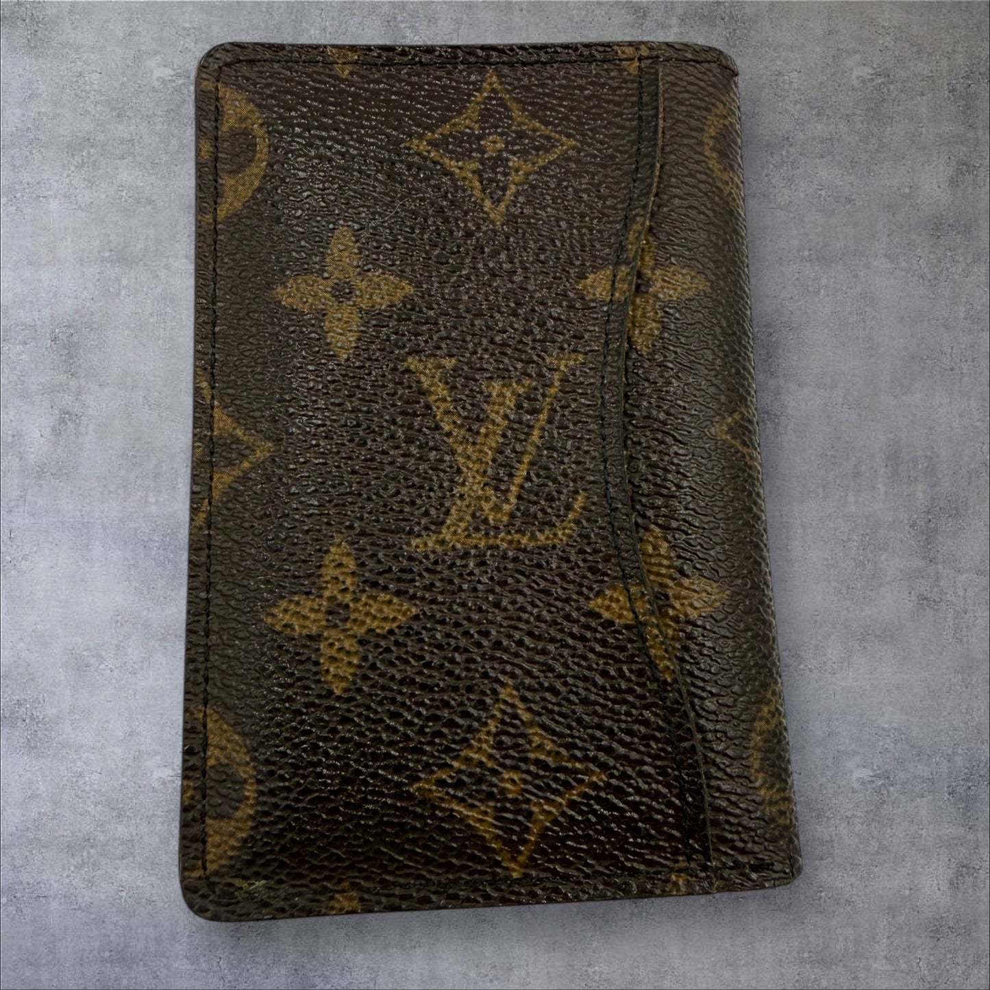 449. Louis Vuitton Monogram pocket organizer
