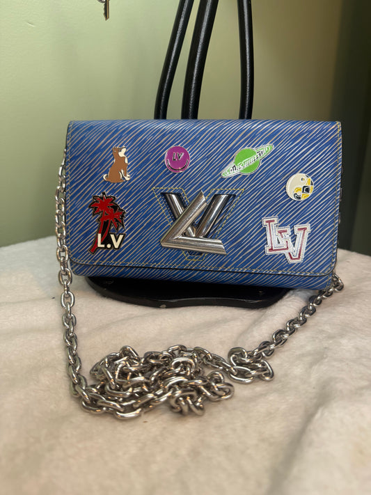 864. Louis Vuitton Blue Denim Twist WOC with embellisments