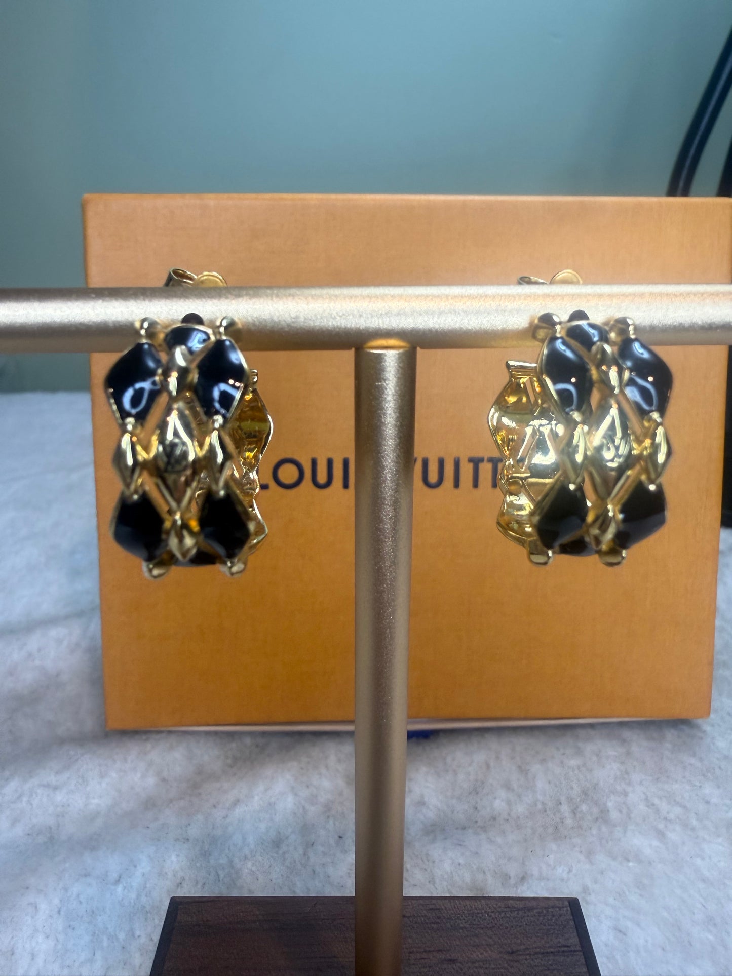 1370. Louis Vuitton Malletage Black and Gold hoop earrings
