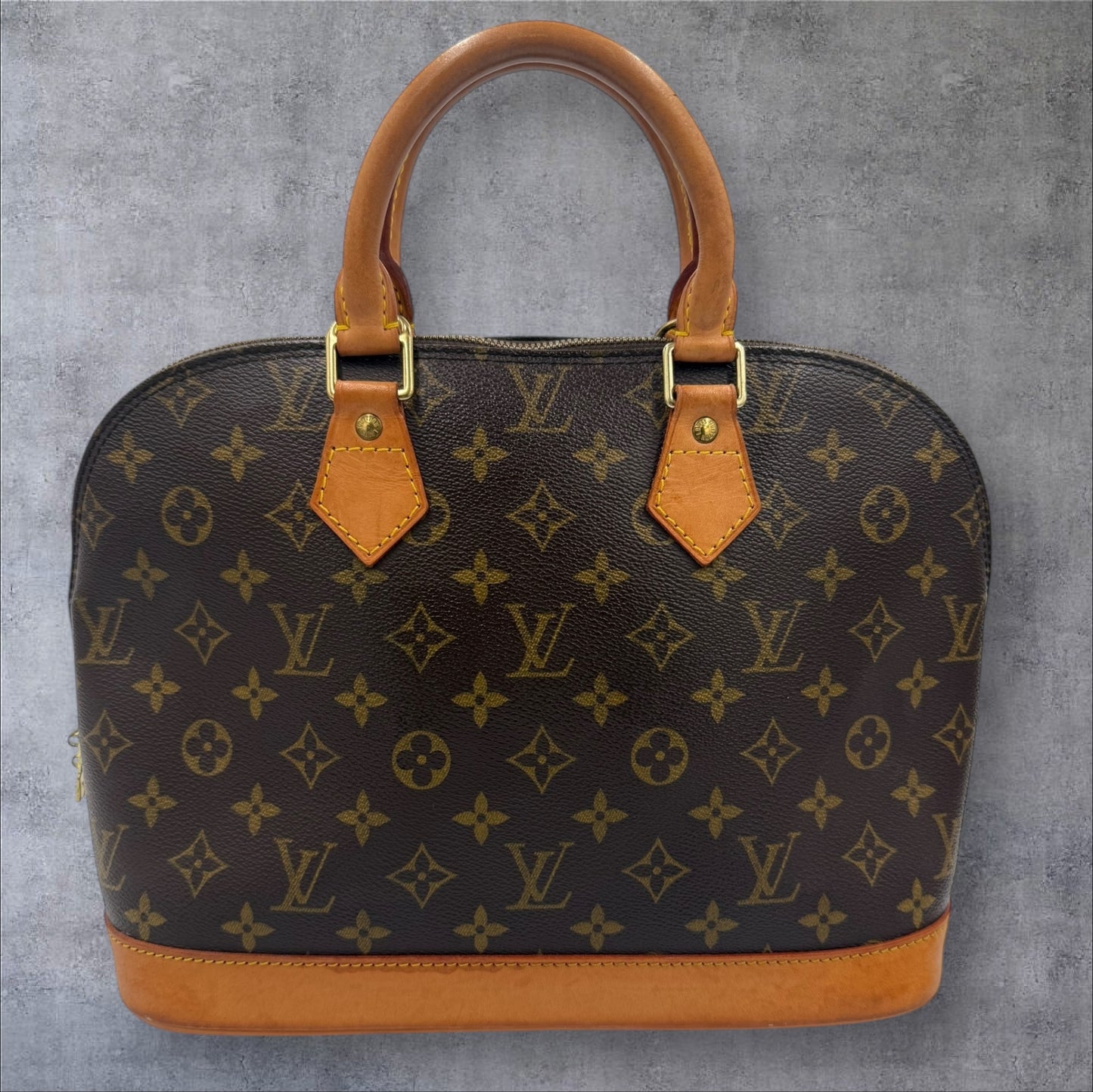 314. Louis Vuitton Monogram Alma PM