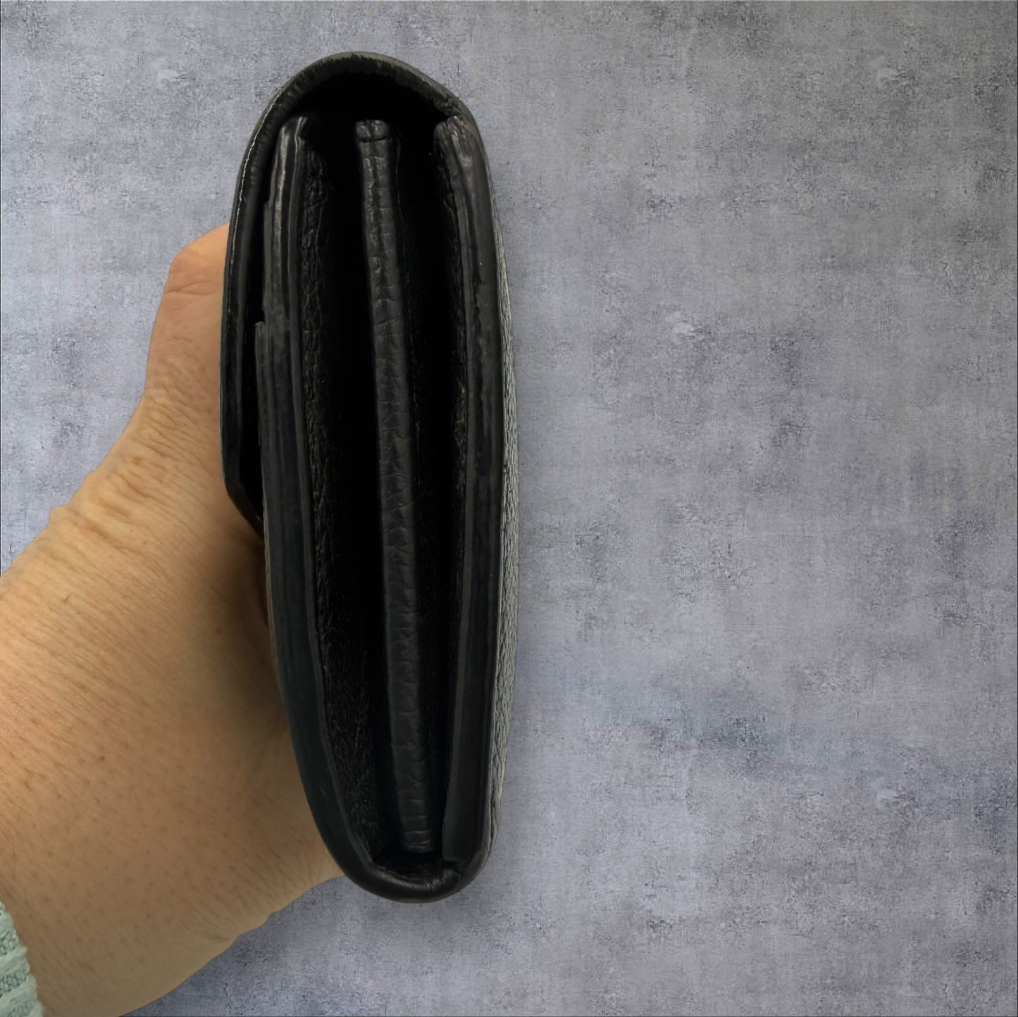 400. Louis Vuitton Bicolor Monogram Empriente Sarah Wallet