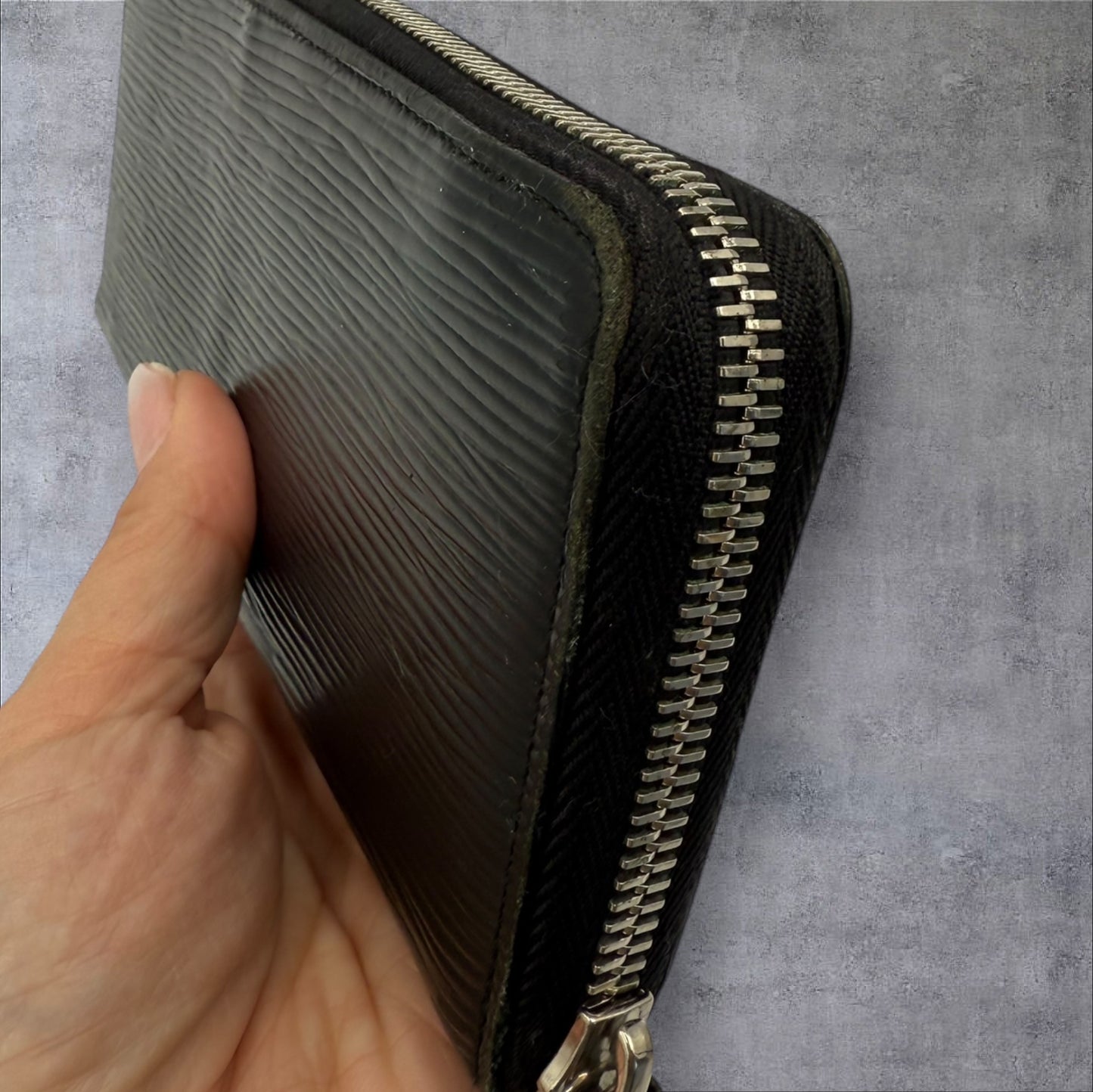 312. Louis Vuitton Black Epi Long Zippy Wallet