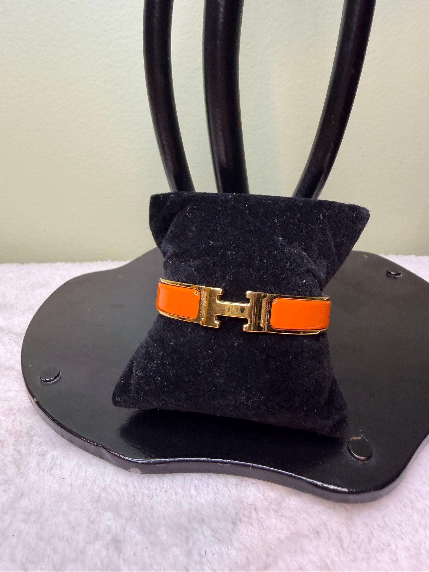 1579. Hermes Clic Clac H Orange and Gold Bracelet