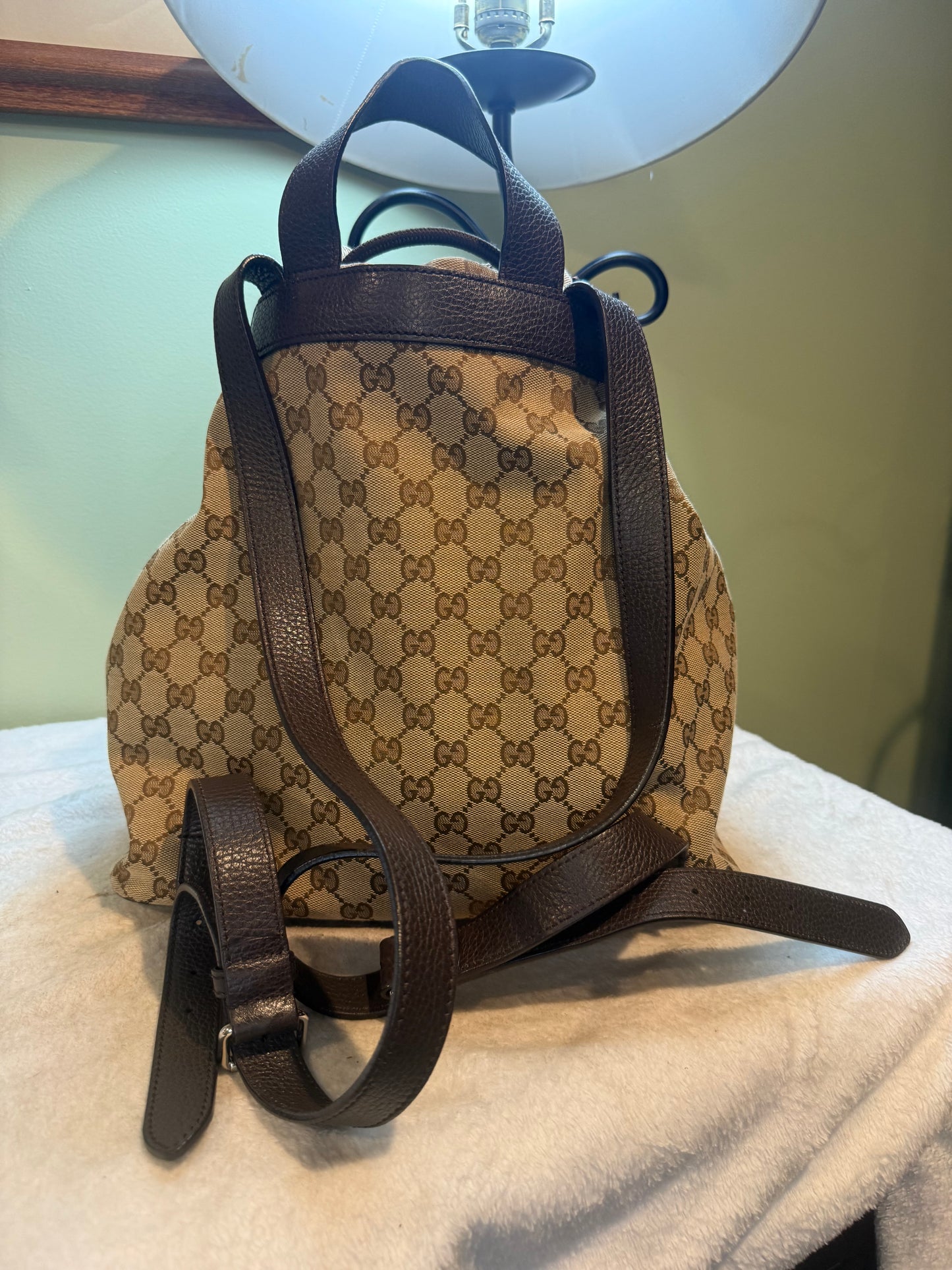 1679. Gucci GG Supreme Canvas Drawstring Backpack