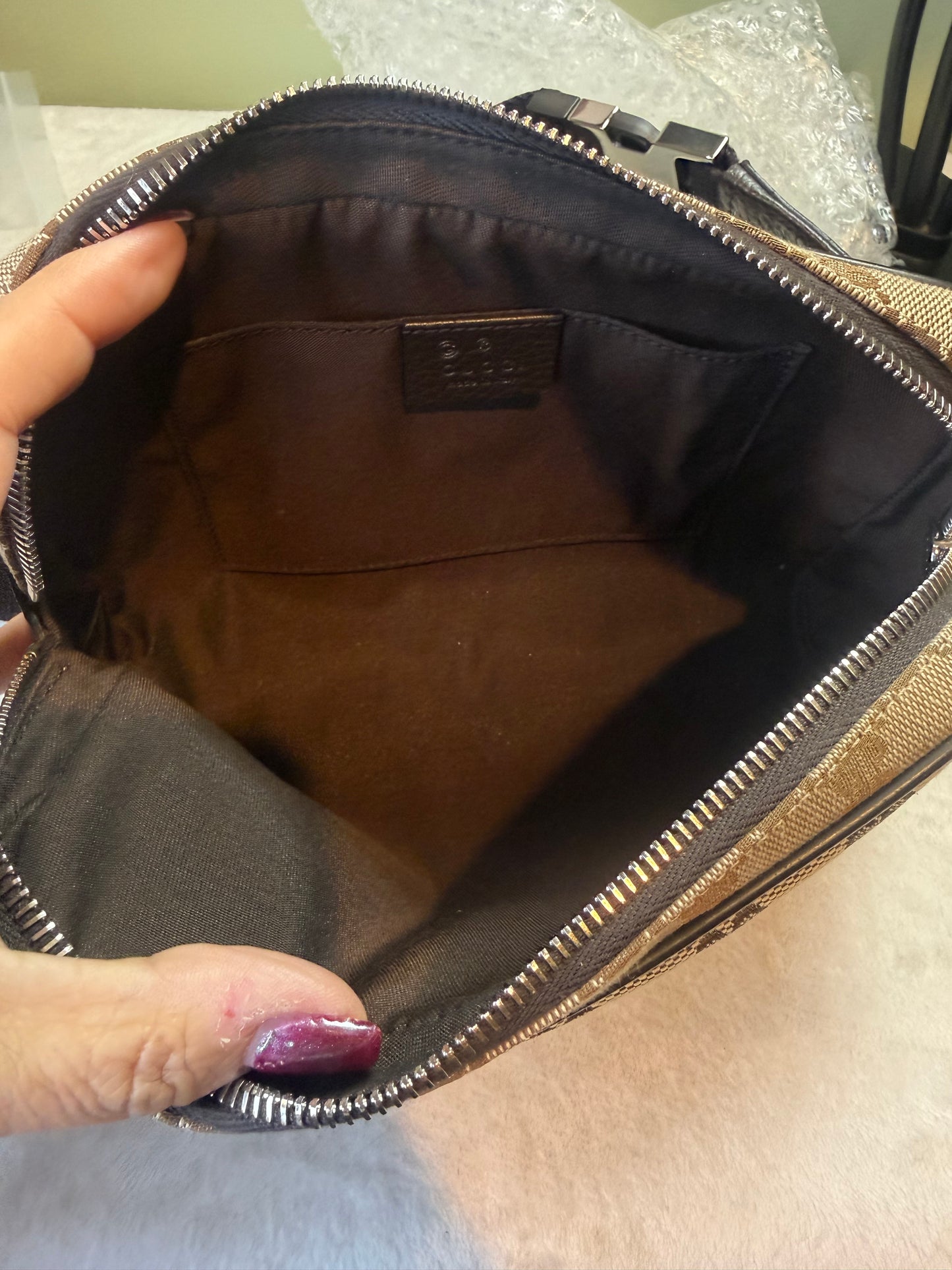 1911. Gucci GG Monogram Canvas Belt Bag
