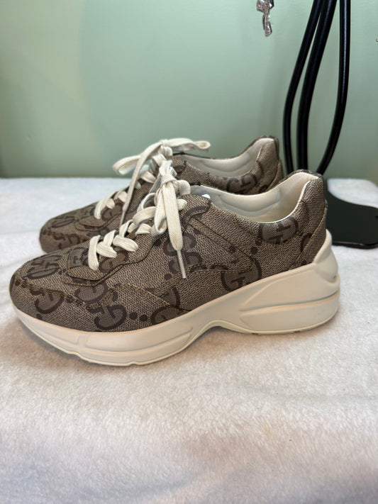 811. Gucci 100 Rhyton Sneakers in Beige Monogram