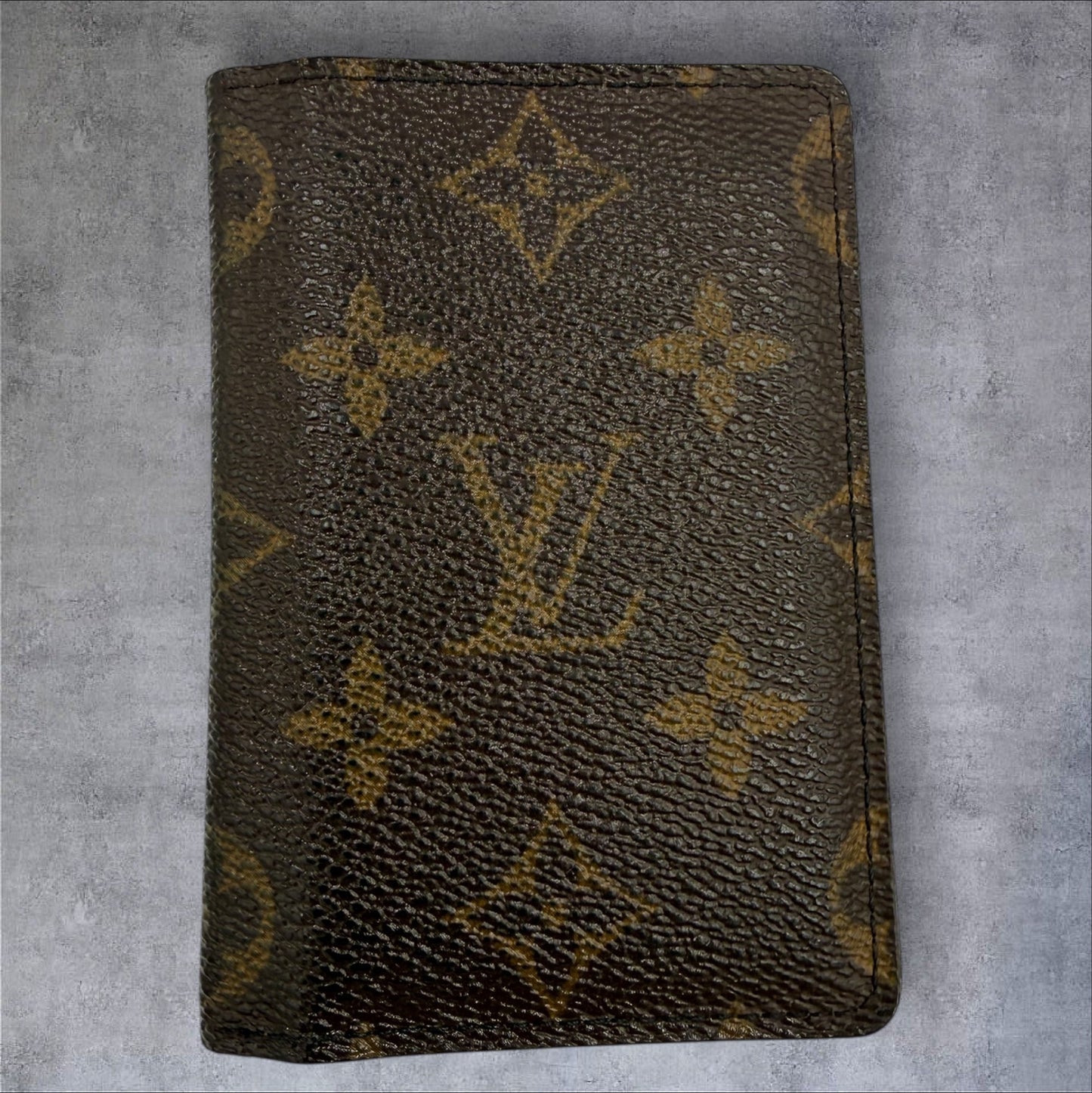 449. Louis Vuitton Monogram pocket organizer