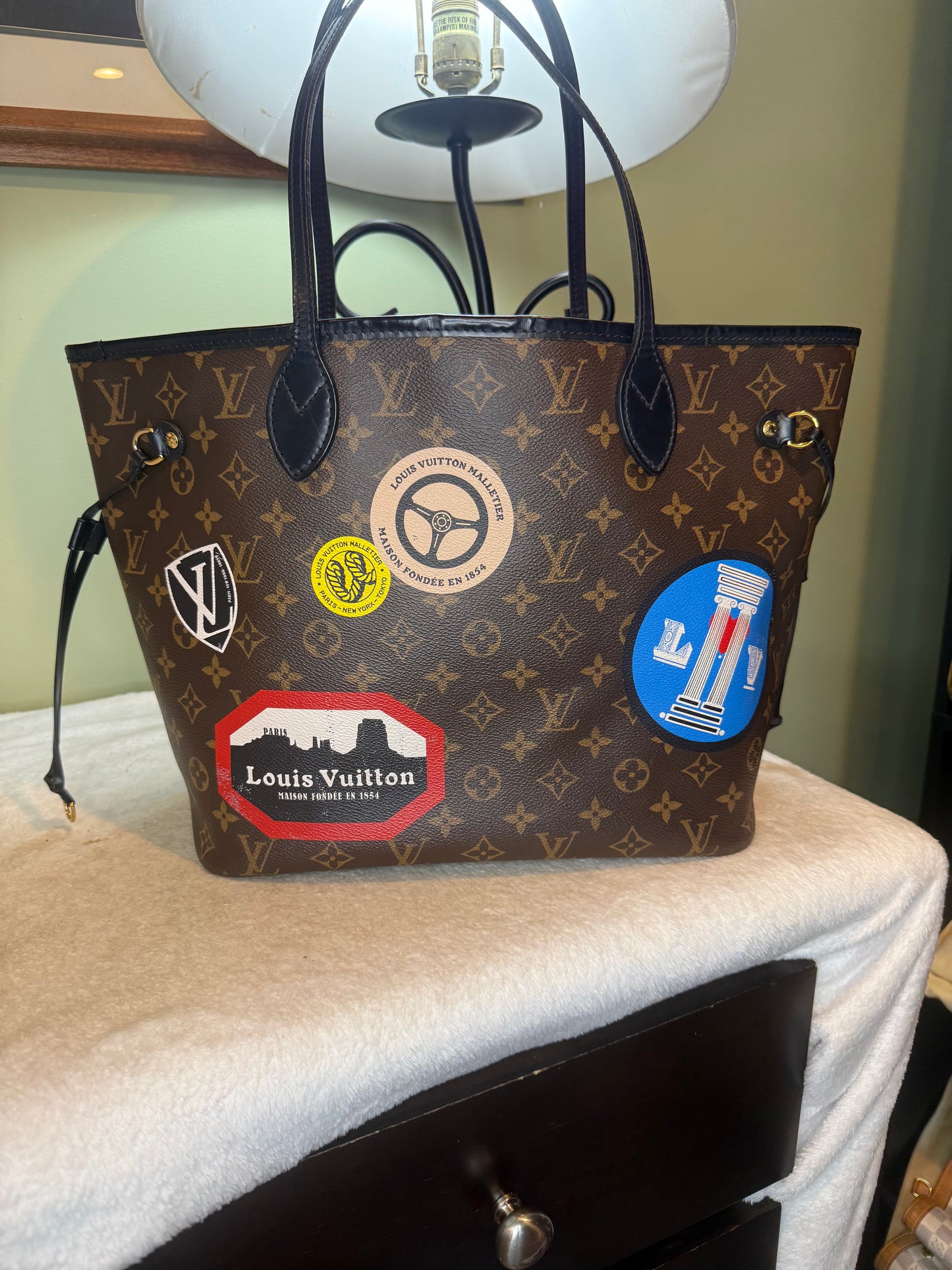 1292. Louis Vuitton Monogram World Tour Neverfull MM with Pouch