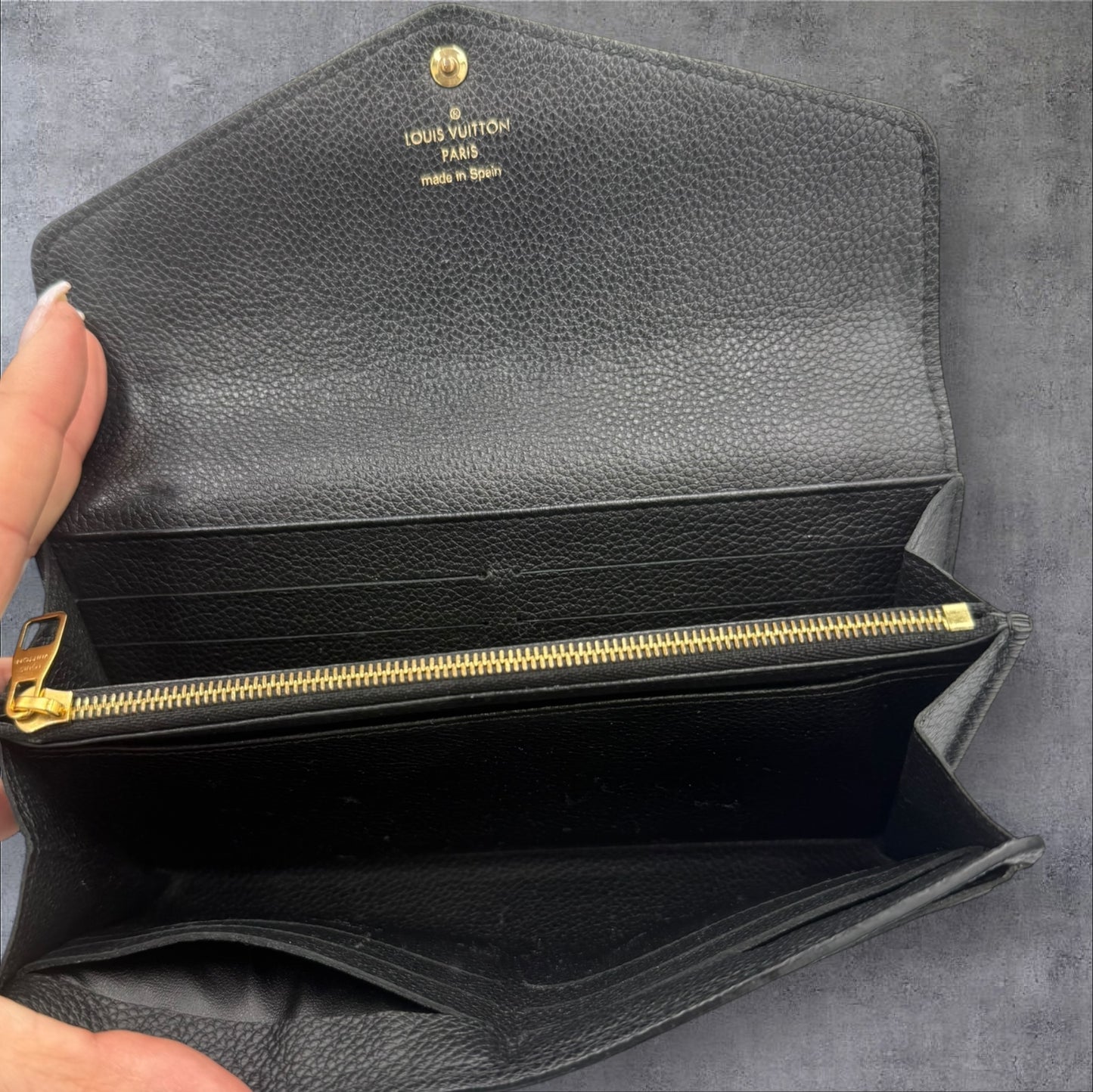 400. Louis Vuitton Bicolor Monogram Empriente Sarah Wallet