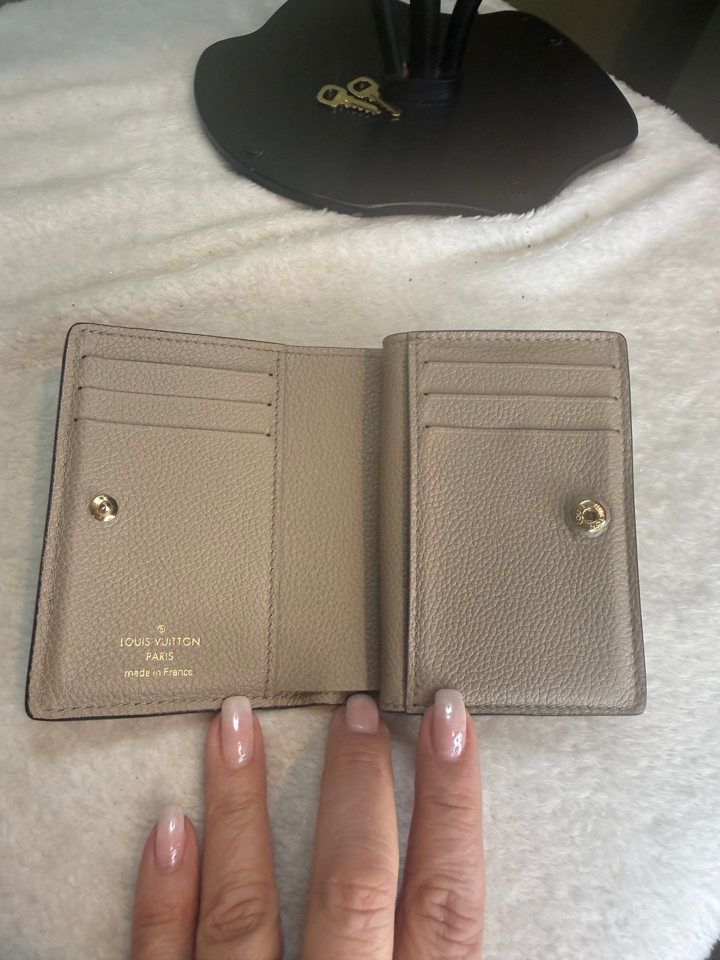 201. Louis Vuitton Monogram Empriente compact Clea Wallet