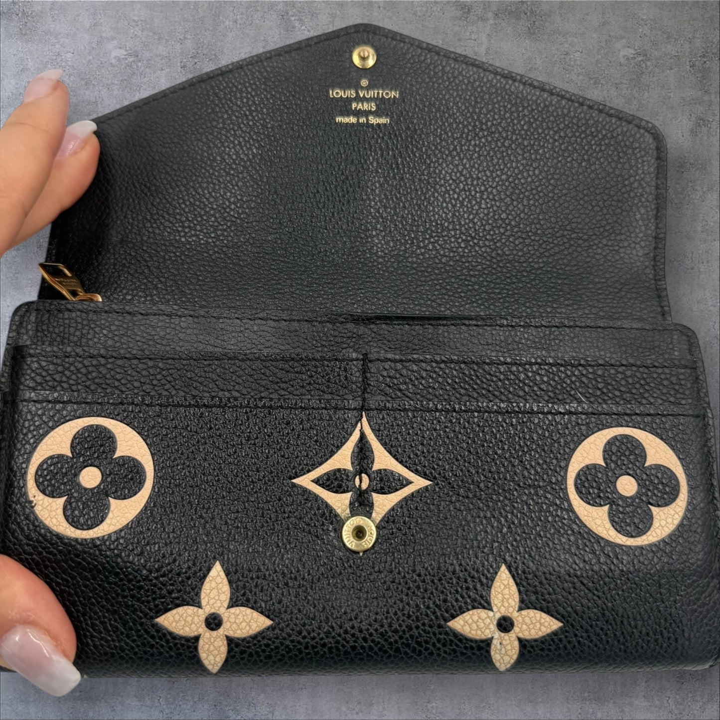 400. Louis Vuitton Bicolor Monogram Empriente Sarah Wallet
