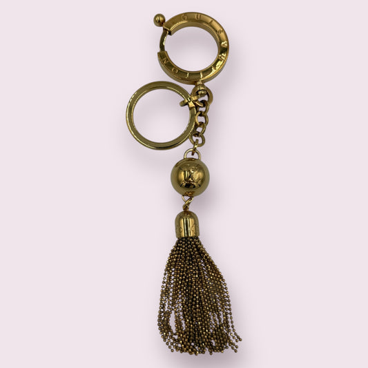 309. Louis Vuitton Gold Tassel Bag Charm