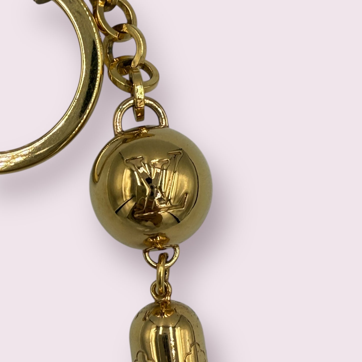 309. Louis Vuitton Gold Tassel Bag Charm