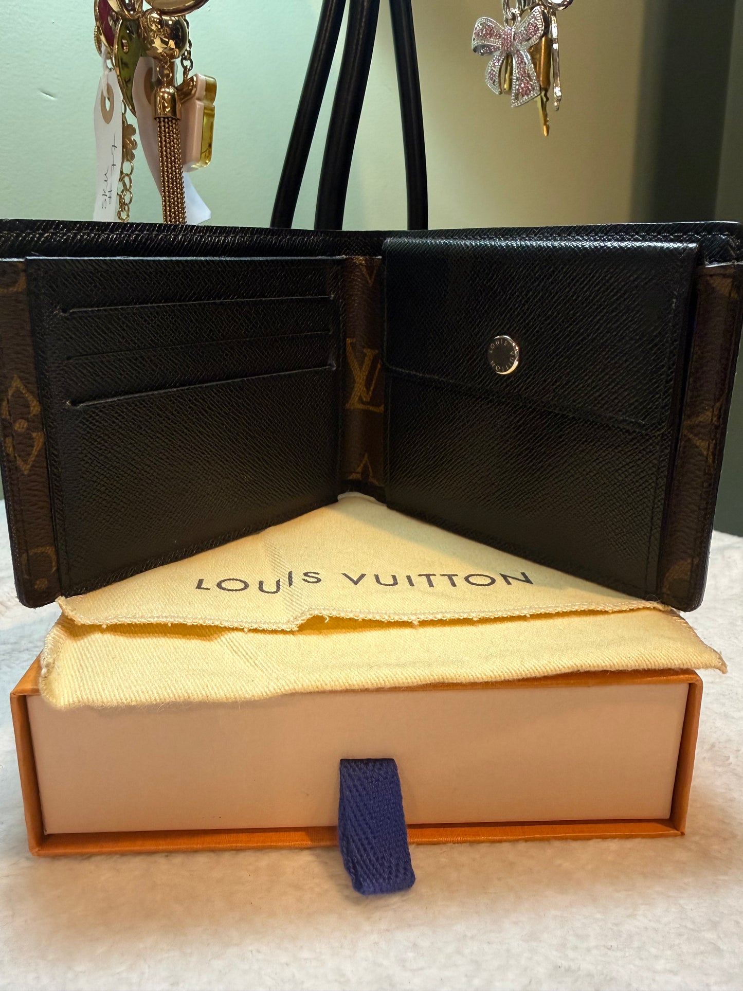 506. Louis Vuitton Monogram Macassar with black Bifold Wallet