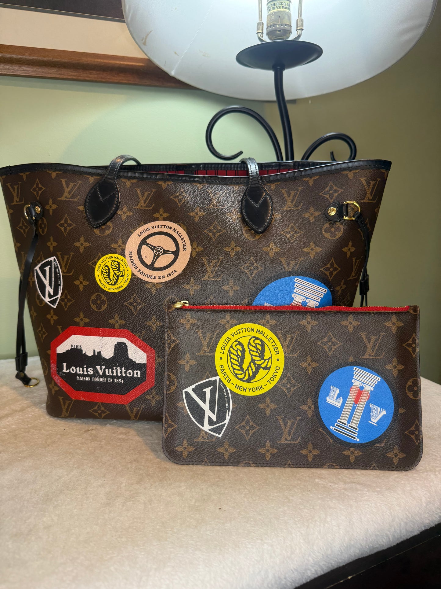 1292. Louis Vuitton Monogram World Tour Neverfull MM with Pouch