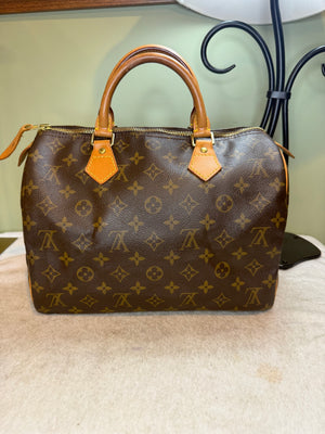 1553. Louis Vuitton Monogram Speedy 30