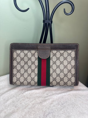 1389. Gucci GG Supreme Cosmetic/ Clutch bag