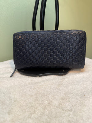 1674. Gucci Navy Leather Guccissima Zippy Wallet