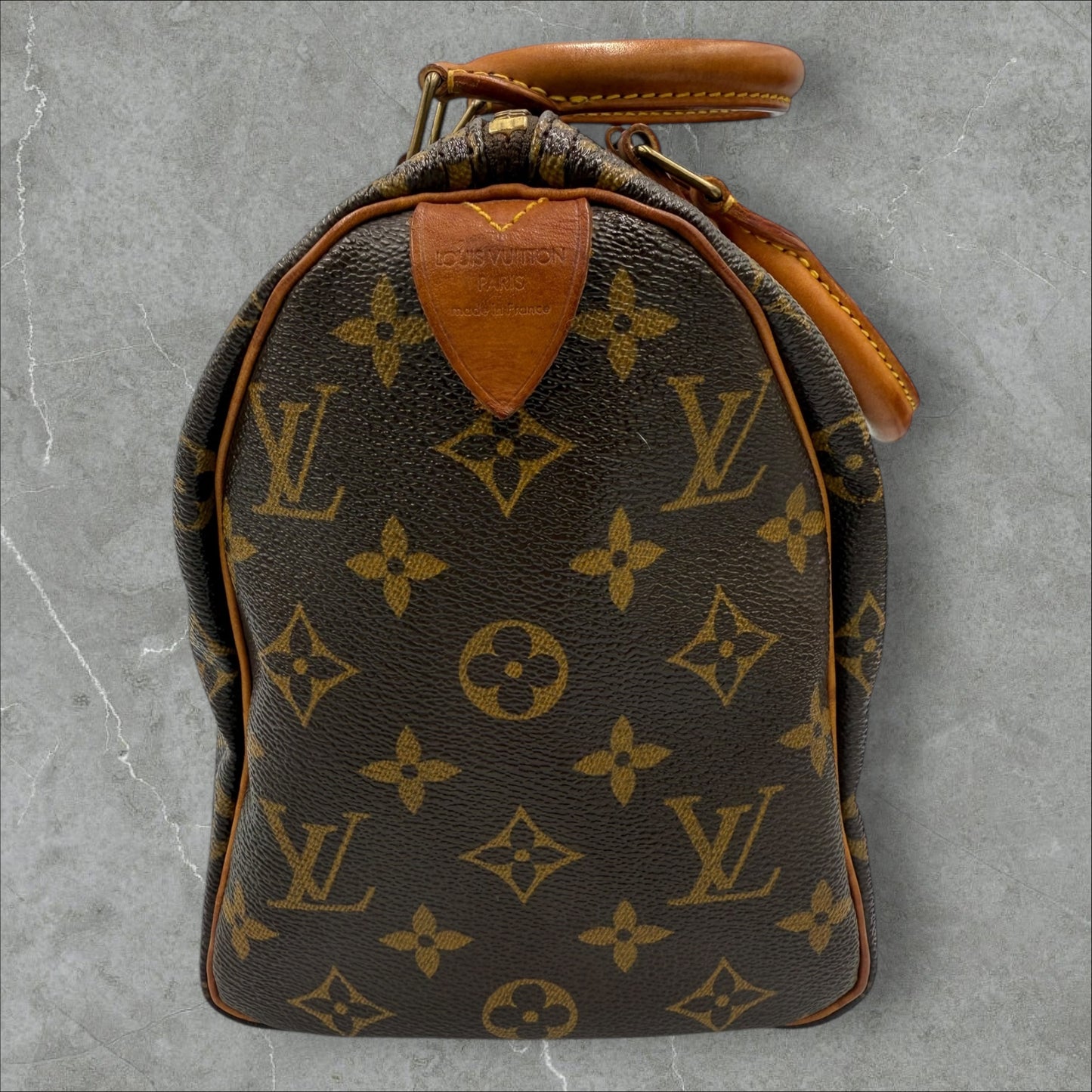 302. Louis Vuitton Monogram Speedy 25