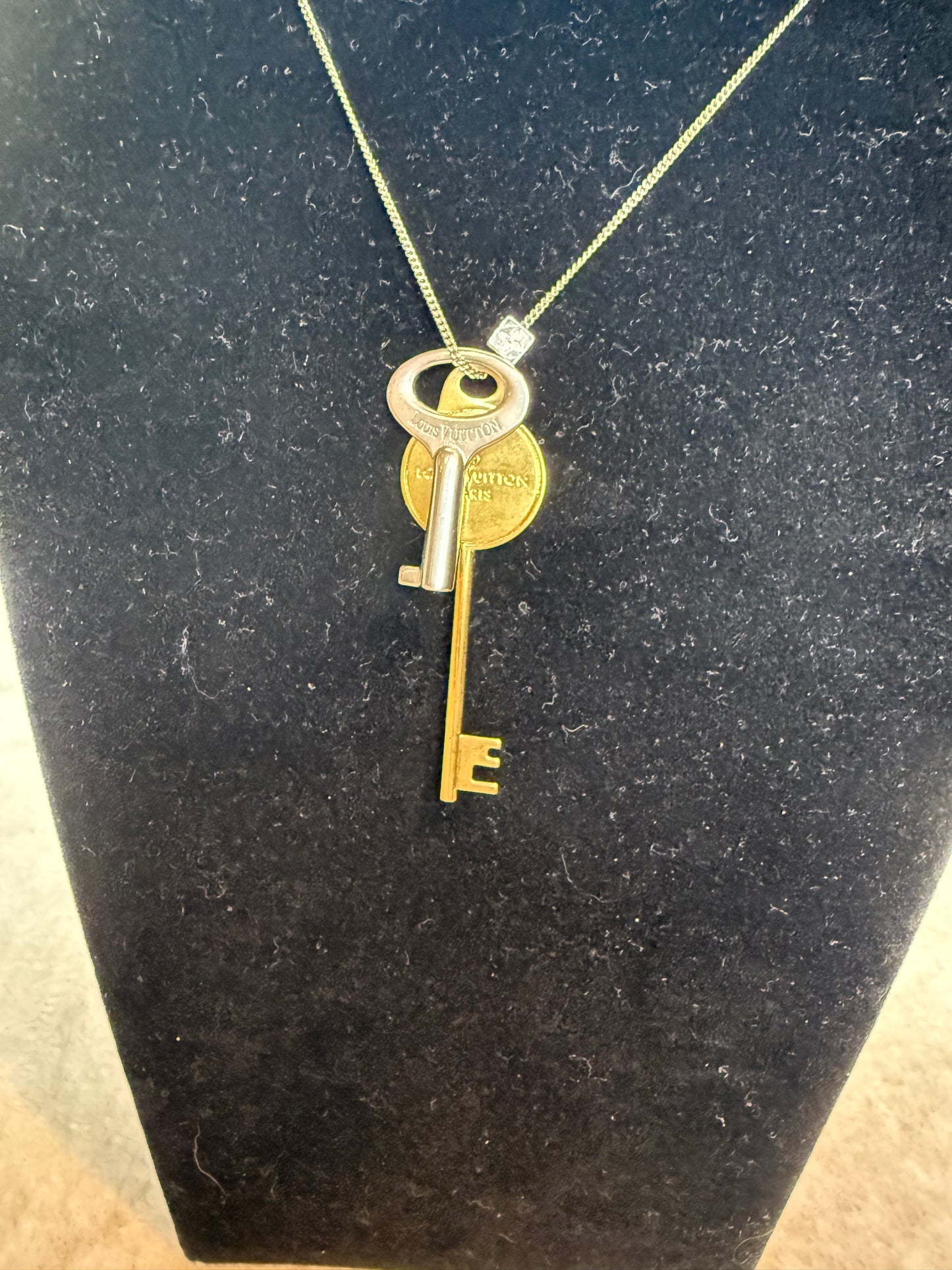 1240. Louis Vuitton LV Gold/Silver Key necklace