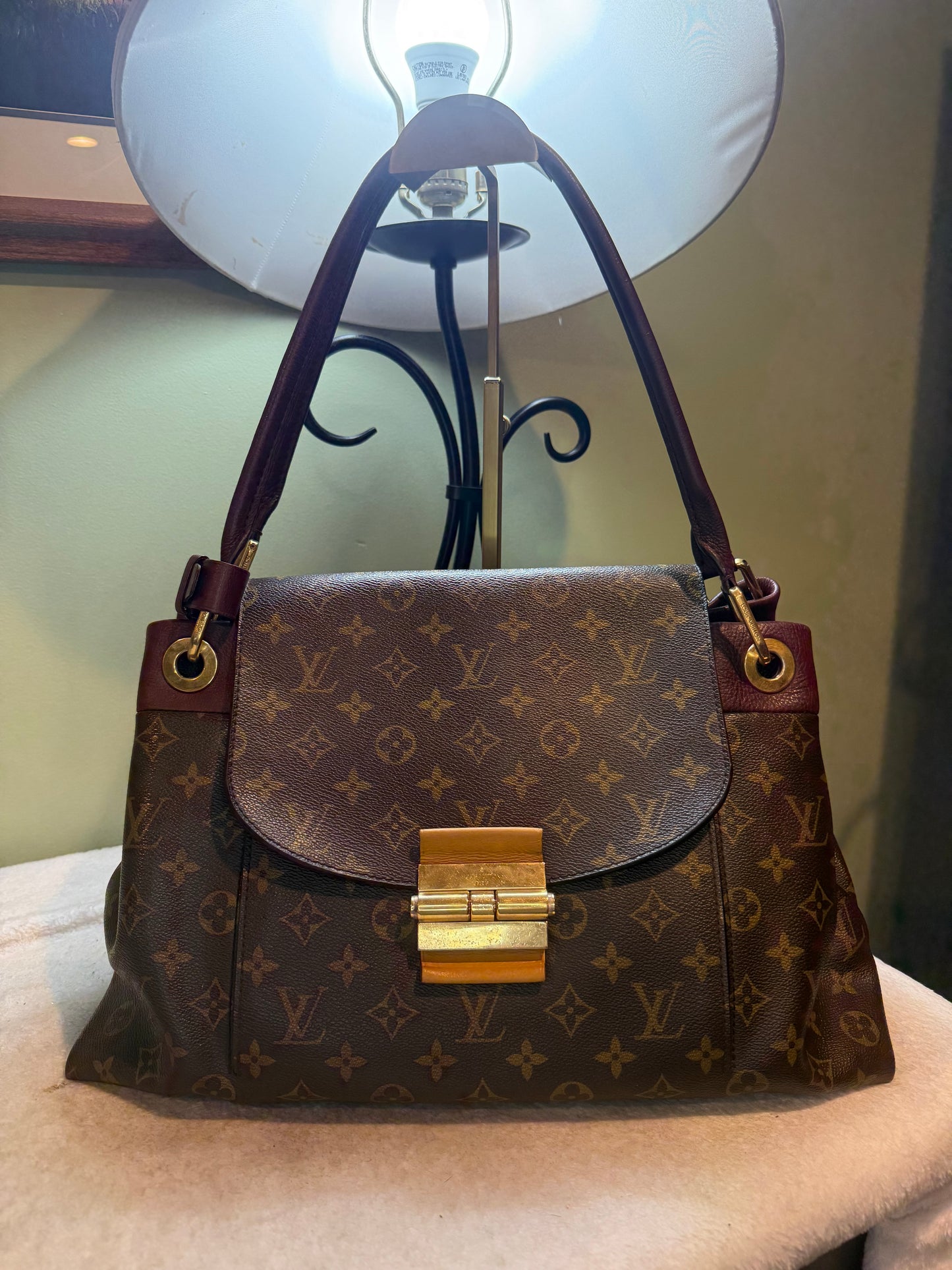 1573. Louis Vuitton Monogram Olympre with Burgundy leather