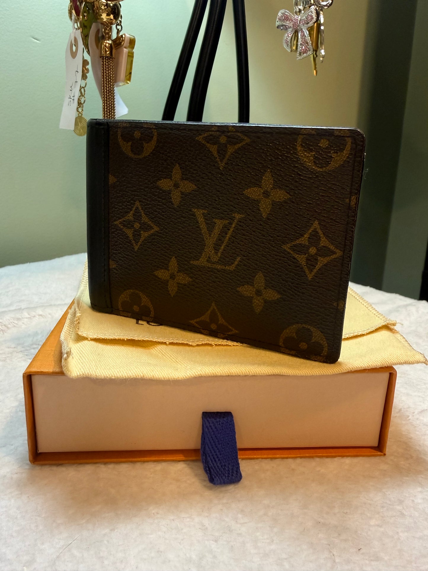 506. Louis Vuitton Monogram Macassar with black Bifold Wallet
