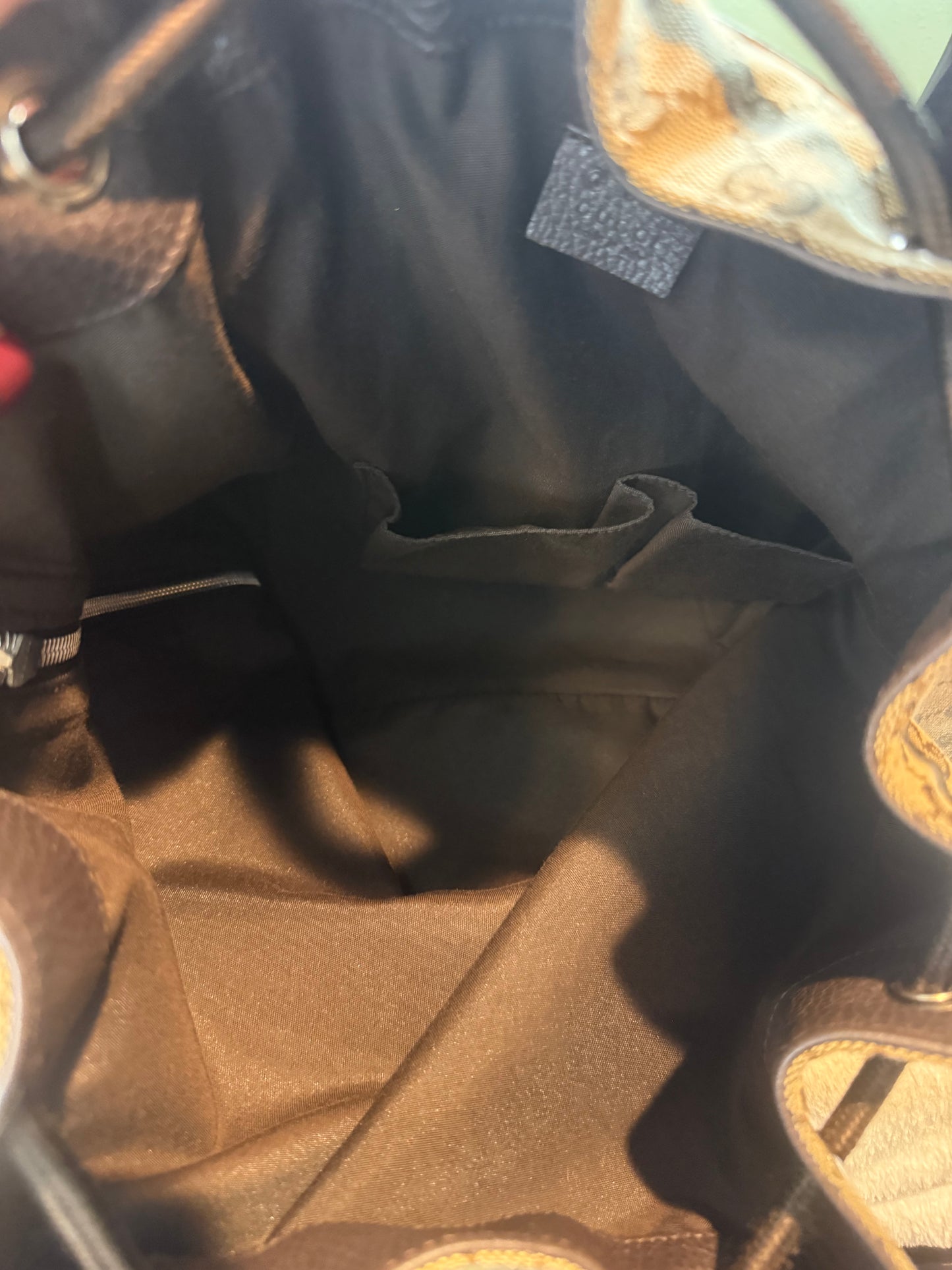 1679. Gucci GG Supreme Canvas Drawstring Backpack