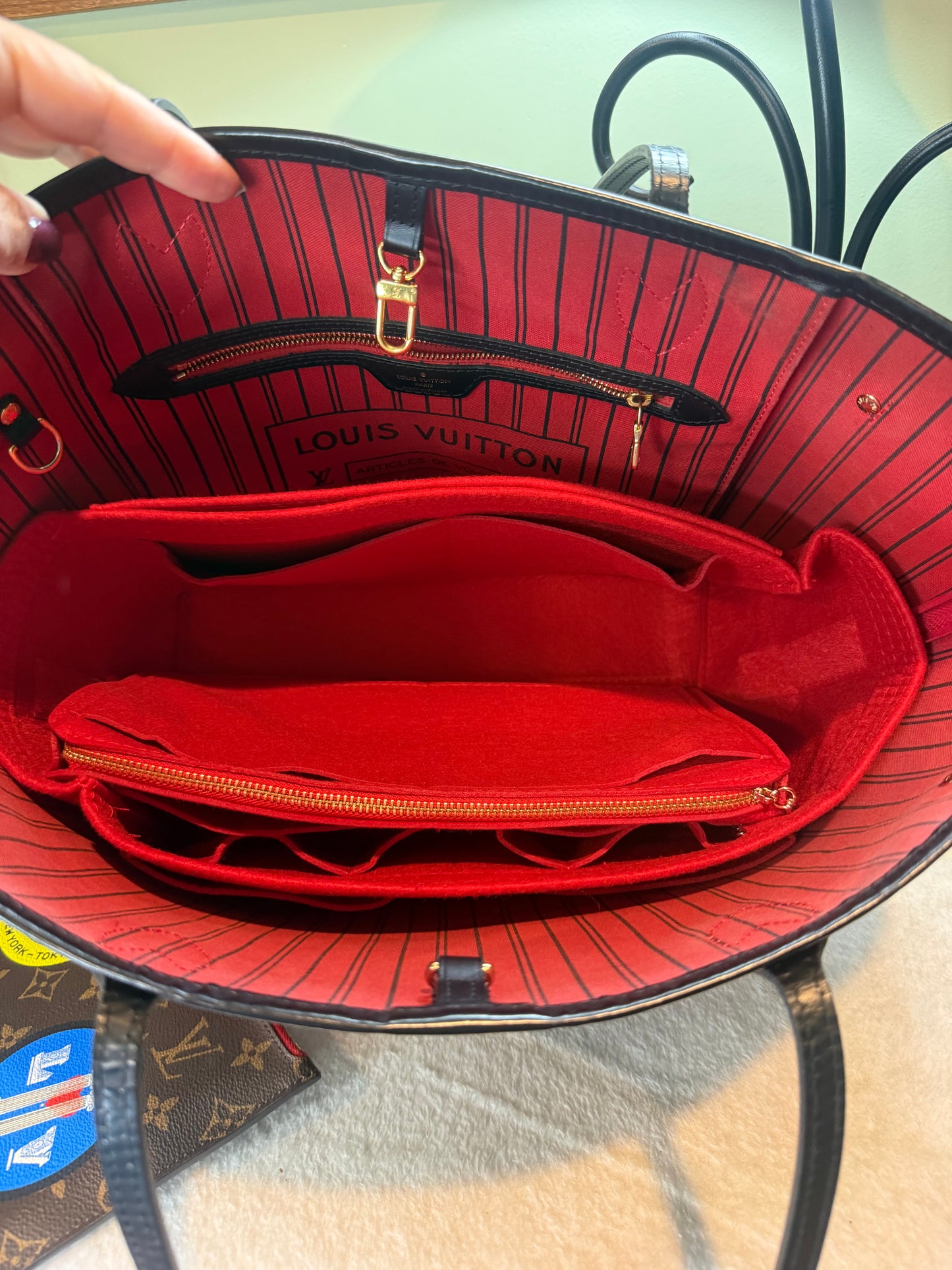 1292. Louis Vuitton Monogram World Tour Neverfull MM with Pouch