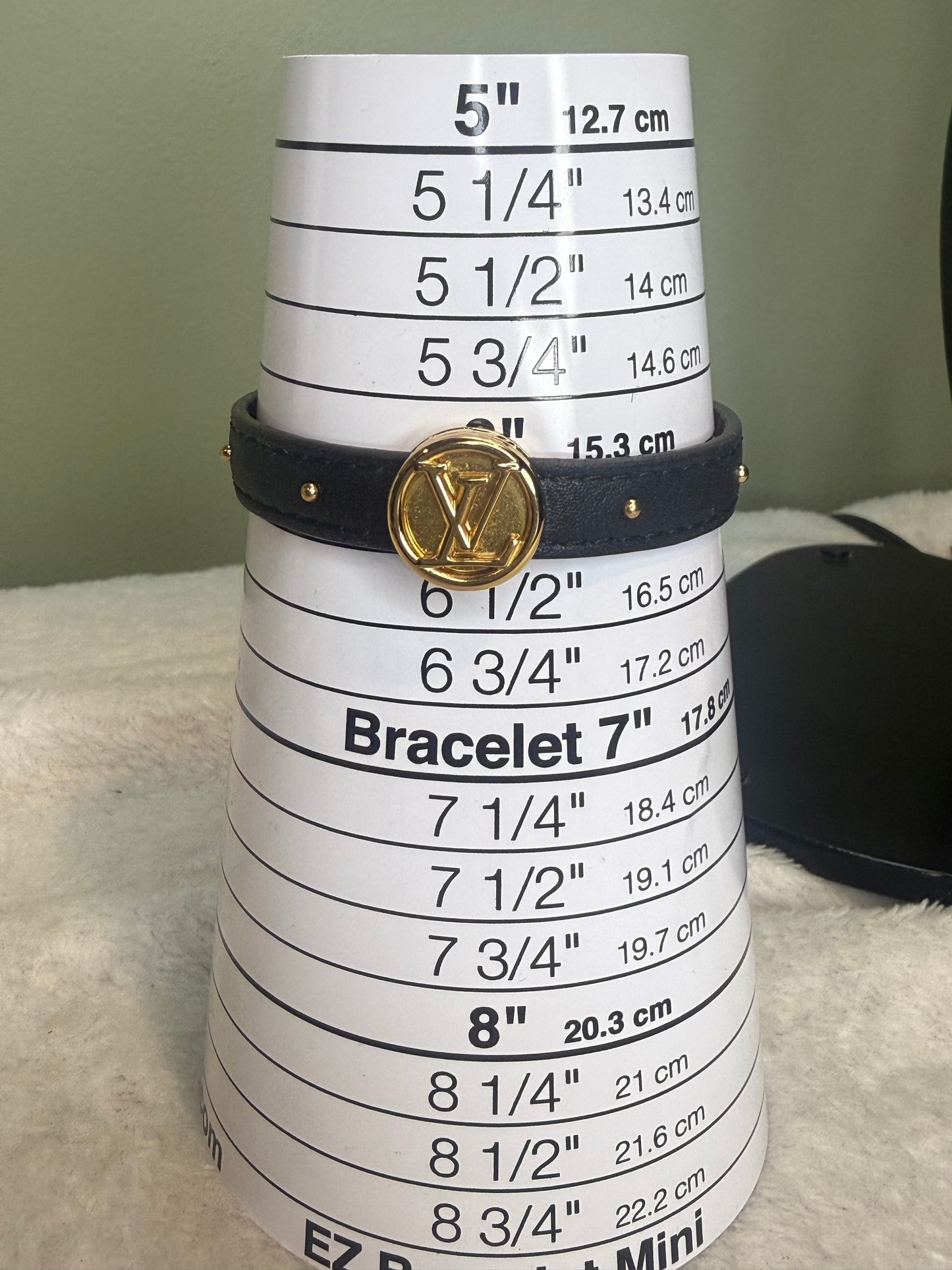 1011. Louis Vuitton Monogram LV Circle Reversible Bracelet