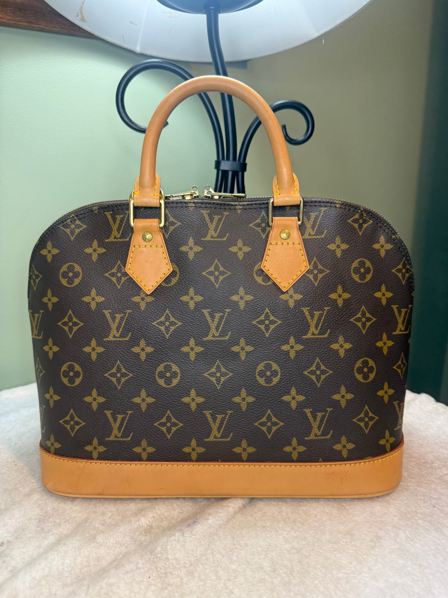 1448. Louis Vuitton Monogram Alma PM