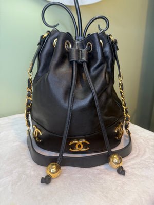 1848. Chanel Vintage Triple Coco Drawstring Bucket Bag