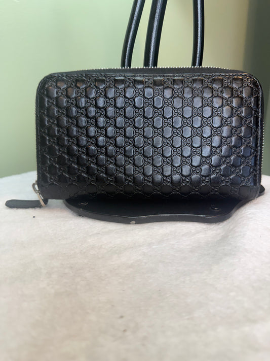 853. Gucci Black Guccisima Zippy Leather Wallet