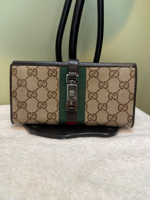 1599. Gucci Canvas Jackie Continental Wallet