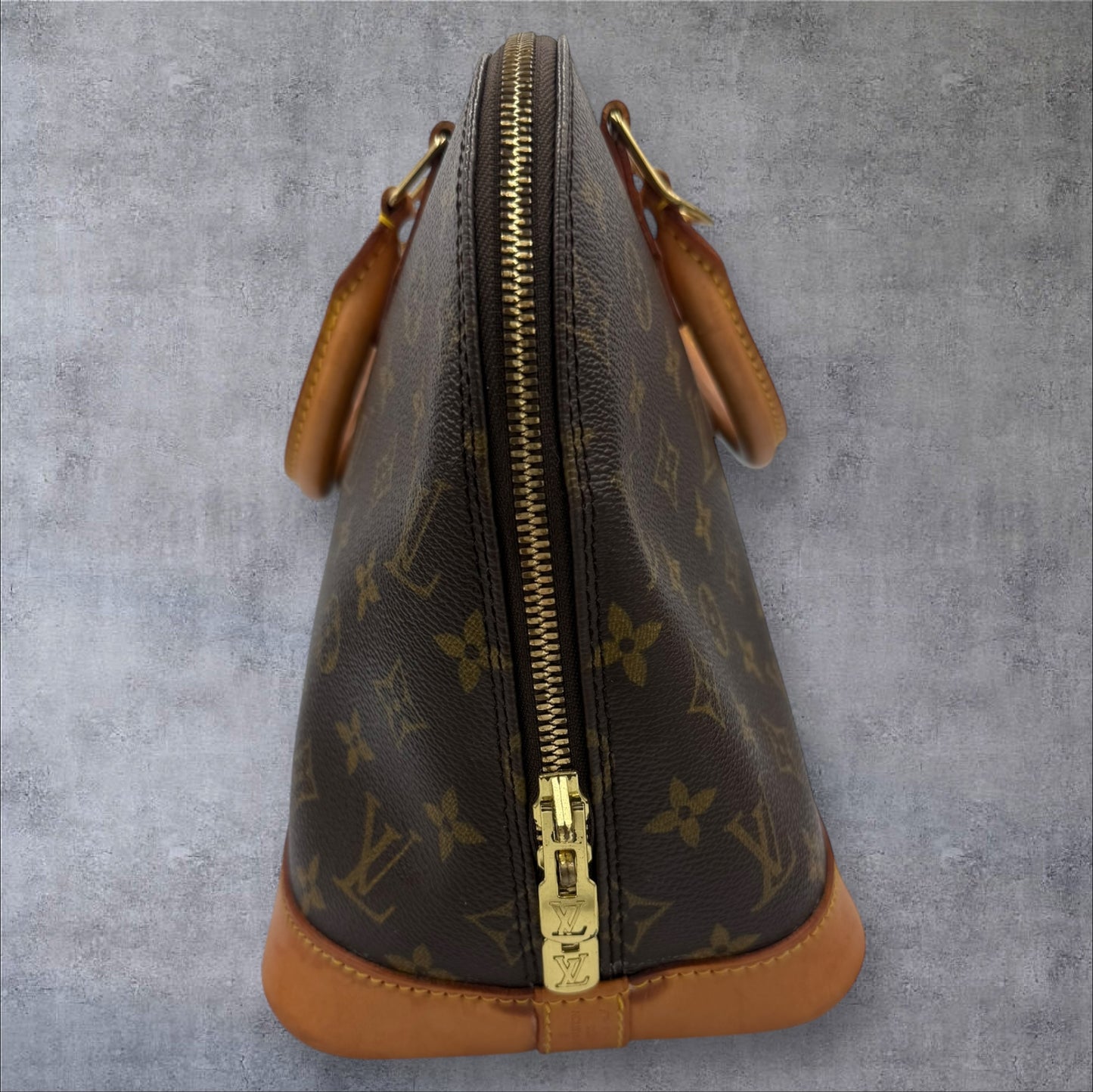 314. Louis Vuitton Monogram Alma PM