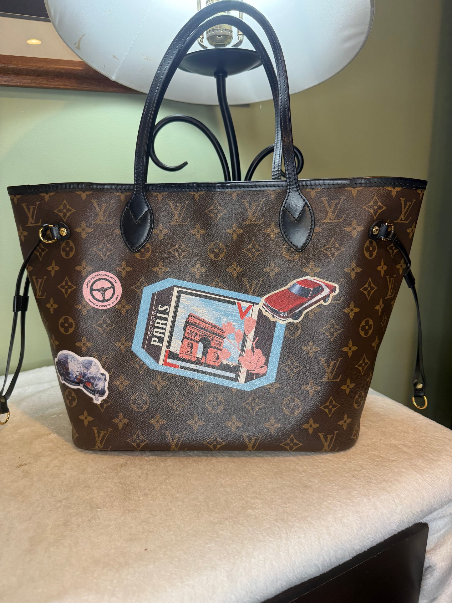 1292. Louis Vuitton Monogram World Tour Neverfull MM with Pouch